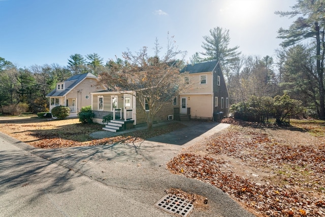 view of front property featuring covered porch