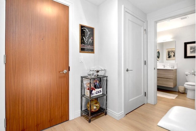 foyer featuring light wood-type flooring