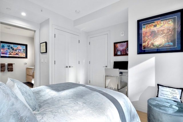 bedroom featuring hardwood / wood-style flooring