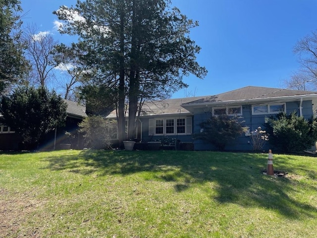 exterior space with a lawn