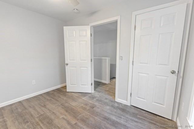 unfurnished bedroom with light hardwood / wood-style floors