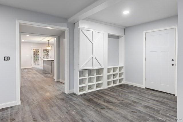 corridor with dark wood-type flooring