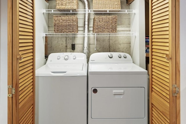 laundry room featuring washer and clothes dryer