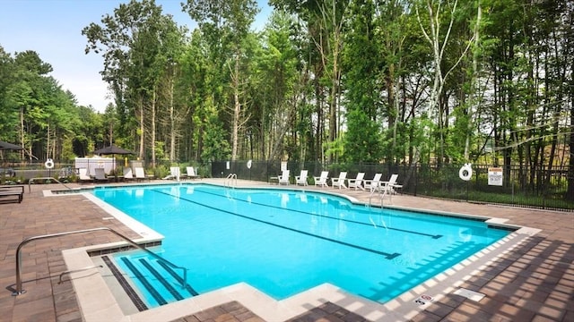 view of pool featuring a patio area