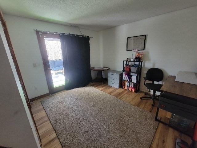 82 Prince Rd, Southbridge, MA 01550 - office space featuring light wood-type flooring and a textured ceiling