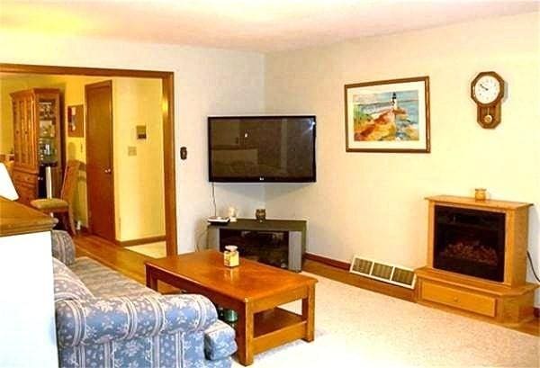 32 Hilltop Ln Unit 2, Easton, MA 02375 - living area featuring baseboards