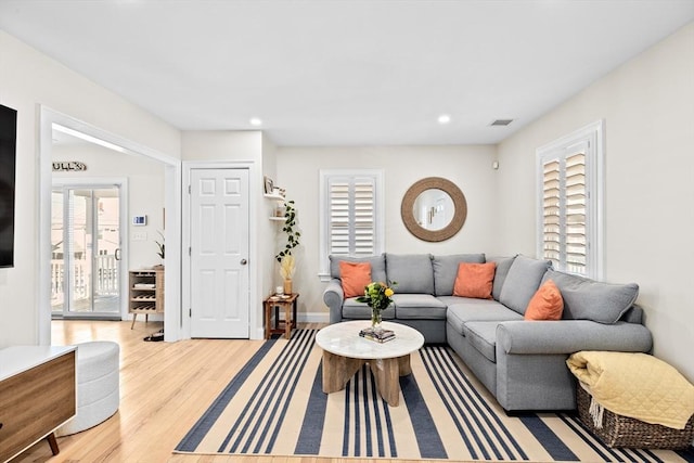 living room with light wood-type flooring