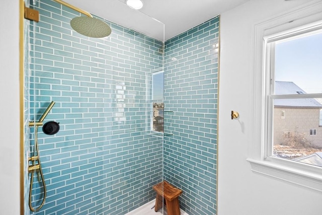 bathroom featuring tiled shower