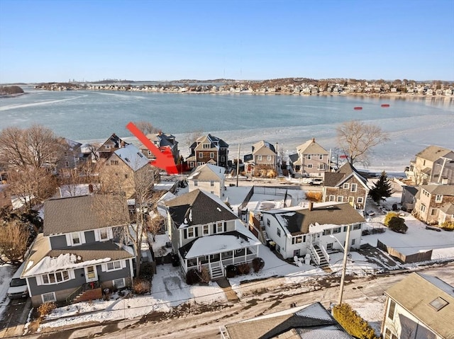 drone / aerial view with a water view