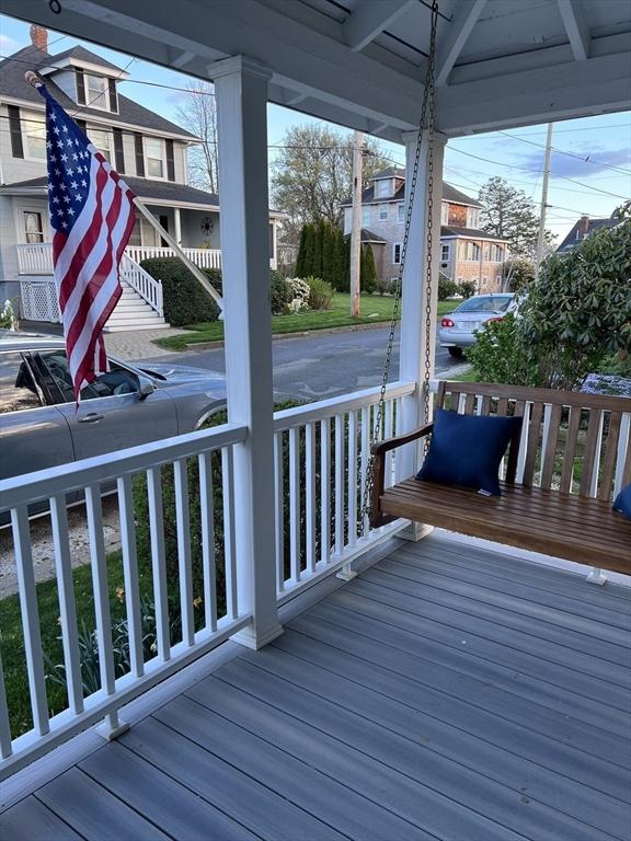 wooden terrace featuring covered porch