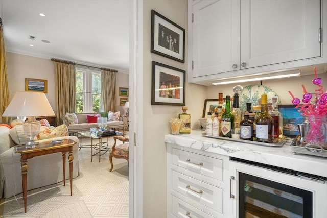 36 Commonwealth Ave Unit 2, Boston, MA 02116 - indoor dry bar with beverage cooler, ornamental molding, and recessed lighting