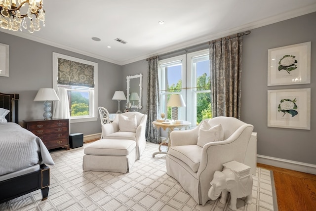 bedroom featuring light hardwood / wood-style flooring, multiple windows, a chandelier, and crown molding