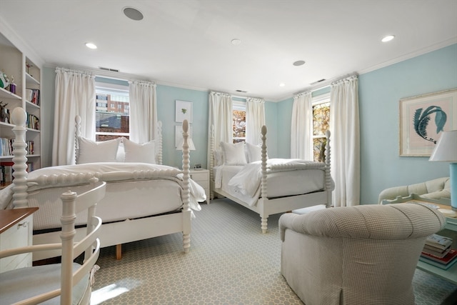 bedroom featuring multiple windows, carpet, and crown molding