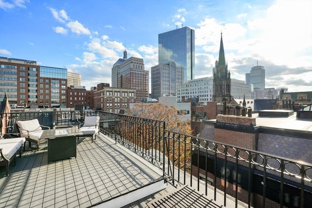 36 Commonwealth Ave Unit 2, Boston, MA 02116 - view of patio / terrace featuring a skyline view and a balcony