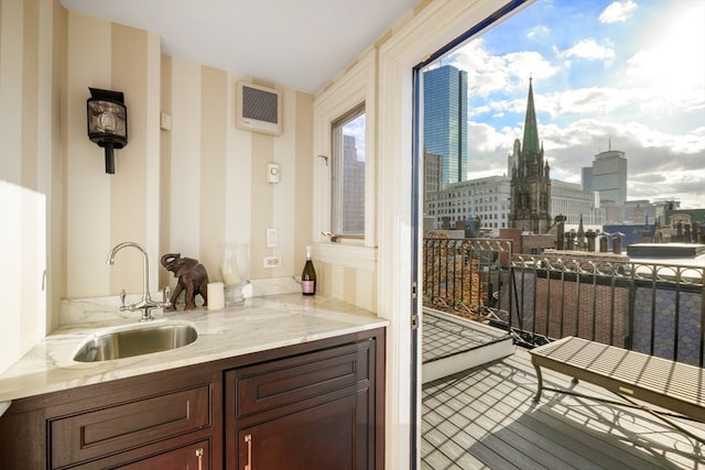 balcony with a wall mounted AC and sink