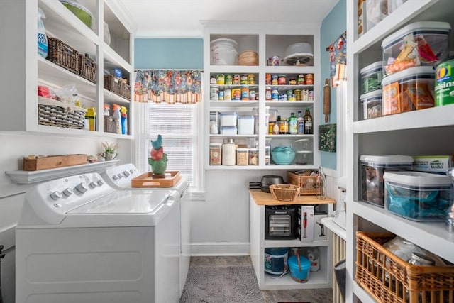 pantry featuring washing machine and dryer
