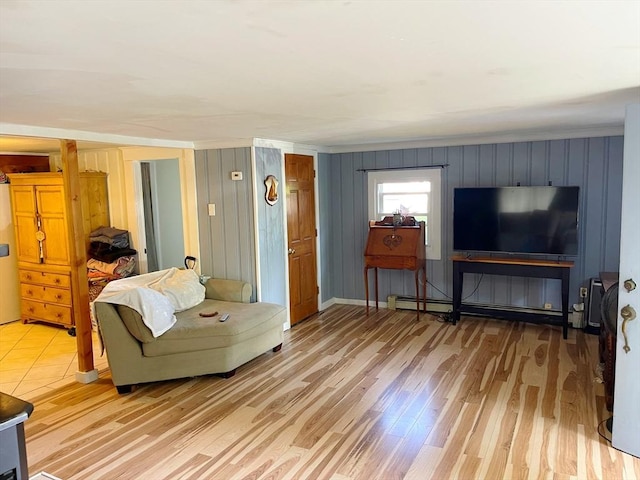 8 Sandy Ln, Pembroke, MA 02359 - living area featuring baseboard heating and light wood-style floors
