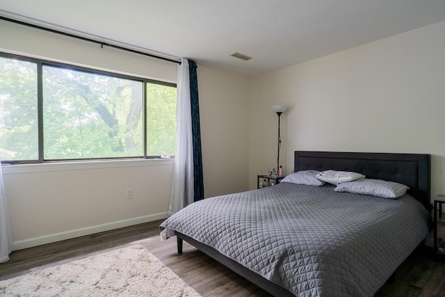 19 Burnham St Unit C2, Belmont, MA 02478 - bedroom with wood finished floors and baseboards