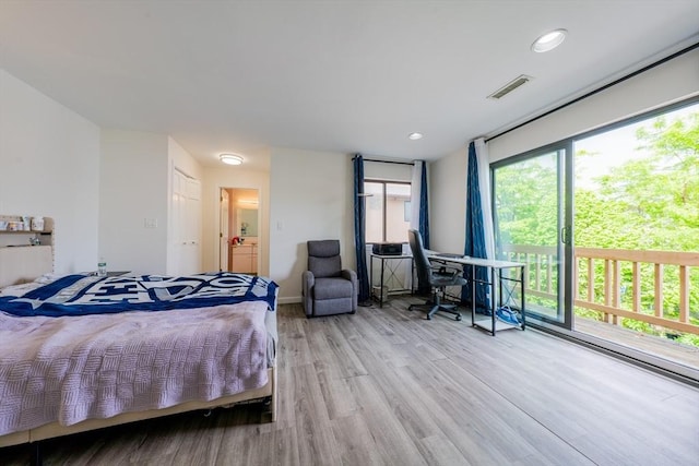 19 Burnham St Unit C2, Belmont, MA 02478 - bedroom with wood finished floors, recessed lighting, and connected bathroom