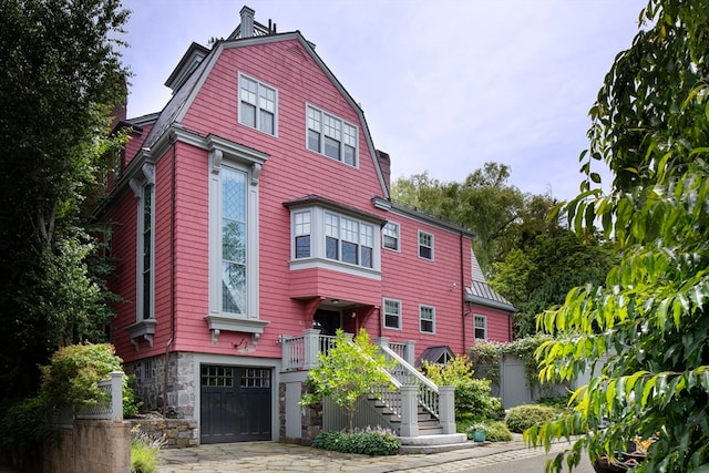 view of front of home with a garage