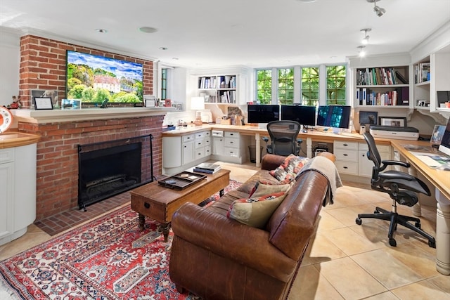 tiled home office with built in desk and a brick fireplace