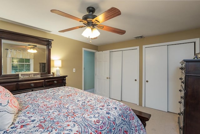 14 W Winkley St, Amesbury, MA 01913 - bedroom featuring multiple closets, light carpet, and a ceiling fan