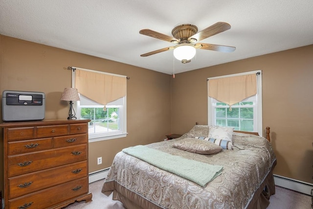 14 W Winkley St, Amesbury, MA 01913 - bedroom with baseboard heating, carpet, and ceiling fan