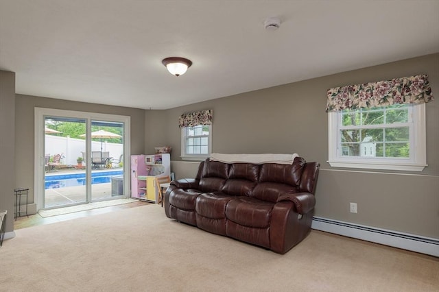 14 W Winkley St, Amesbury, MA 01913 - carpeted living area with a baseboard radiator