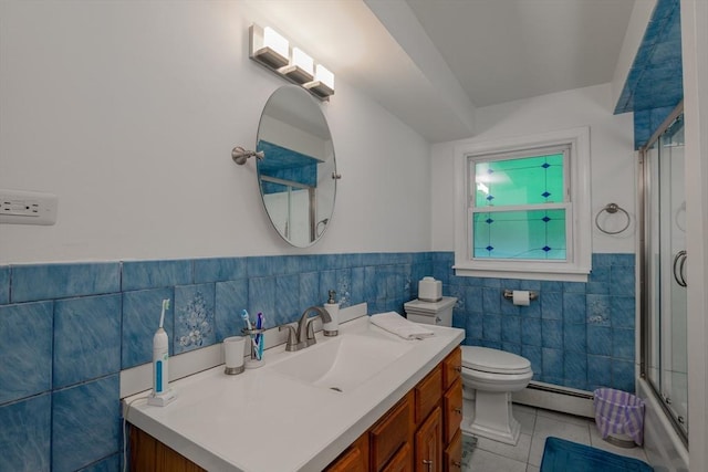 14 W Winkley St, Amesbury, MA 01913 - bathroom featuring tile walls, a baseboard radiator, tile patterned flooring, vanity, and a wainscoted wall