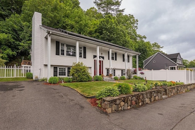 14 W Winkley St, Amesbury, MA 01913 - split foyer home with a chimney