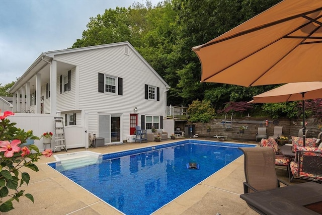 14 W Winkley St, Amesbury, MA 01913 - view of swimming pool featuring a patio area, a fenced backyard, and outdoor lounge area