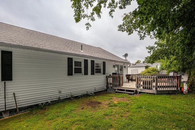 14 W Winkley St, Amesbury, MA 01913 - back of house featuring a yard, a deck, and roof with shingles