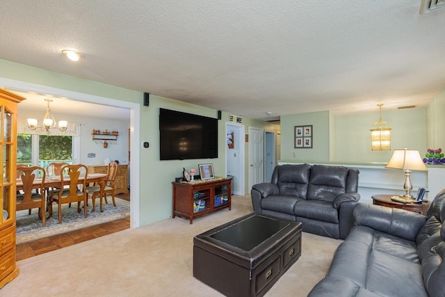 14 W Winkley St, Amesbury, MA 01913 - living area featuring a chandelier and a textured ceiling