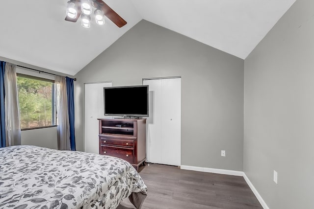 bedroom featuring hardwood / wood-style floors, ceiling fan, and high vaulted ceiling