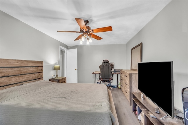 bedroom featuring ceiling fan and light hardwood / wood-style flooring