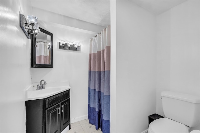 bathroom with tile patterned flooring, vanity, a shower with shower curtain, and toilet