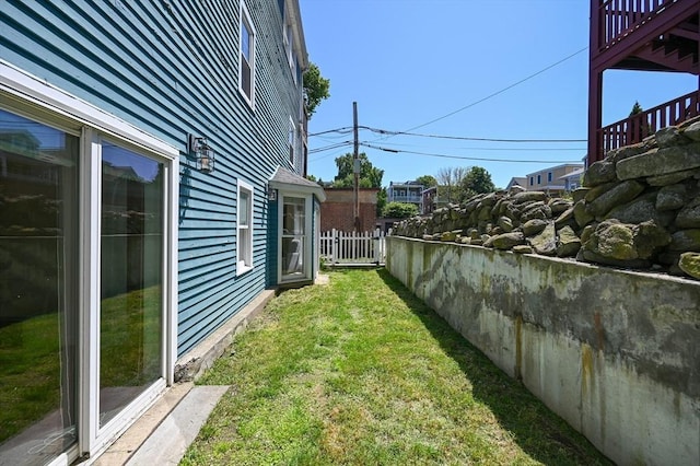 view of yard featuring fence