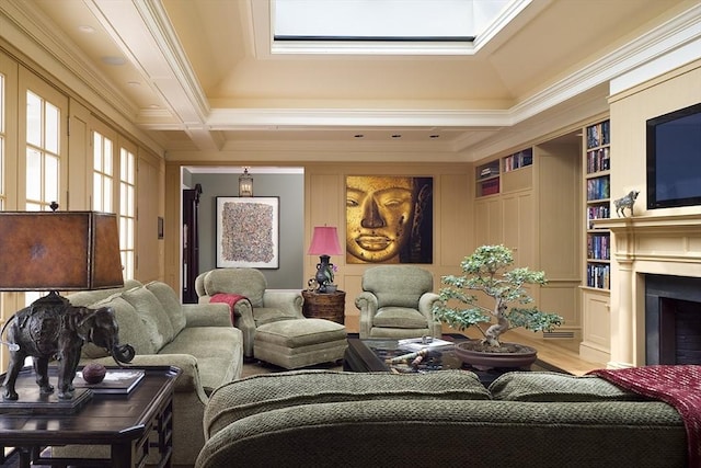 495 Hugh Cargill Rd, Concord, MA 01742 - interior space with ornamental molding, a decorative wall, wood finished floors, a fireplace, and built in shelves