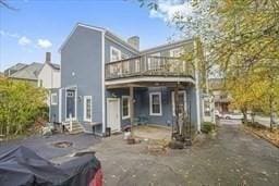 back of house with a patio area