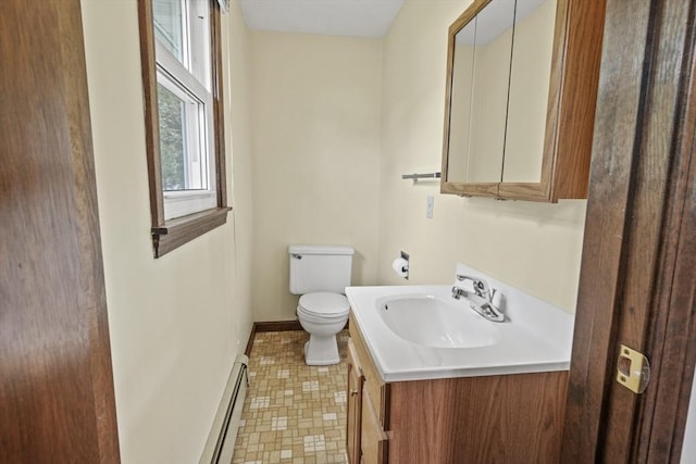 395 Franklin Rd, Fitchburg, MA 01420 - bathroom with toilet, vanity, baseboards, and baseboard heating