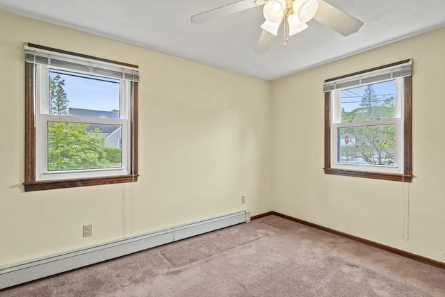 395 Franklin Rd, Fitchburg, MA 01420 - empty room featuring baseboard heating, light colored carpet, baseboards, and a ceiling fan