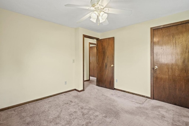 395 Franklin Rd, Fitchburg, MA 01420 - unfurnished bedroom with carpet flooring, baseboards, and a ceiling fan