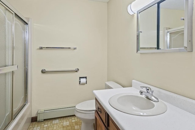 395 Franklin Rd, Fitchburg, MA 01420 - full bathroom with a baseboard radiator, toilet, vanity, combined bath / shower with glass door, and baseboards