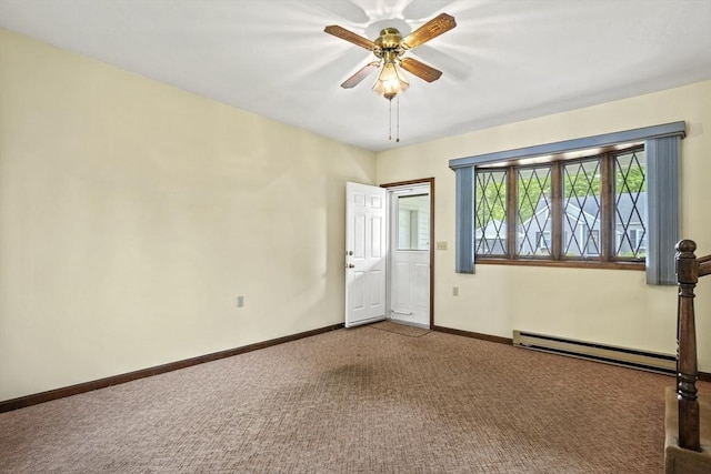 395 Franklin Rd, Fitchburg, MA 01420 - carpeted spare room with baseboards, ceiling fan, and a baseboard heating unit