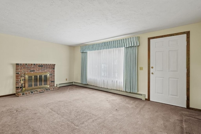 395 Franklin Rd, Fitchburg, MA 01420 - unfurnished living room with carpet floors, a baseboard radiator, a textured ceiling, and a fireplace
