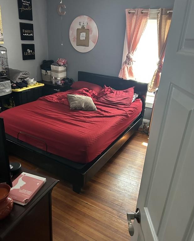bedroom featuring hardwood / wood-style floors