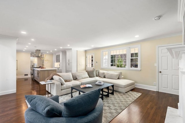 living area featuring recessed lighting, baseboards, crown molding, and dark wood-type flooring