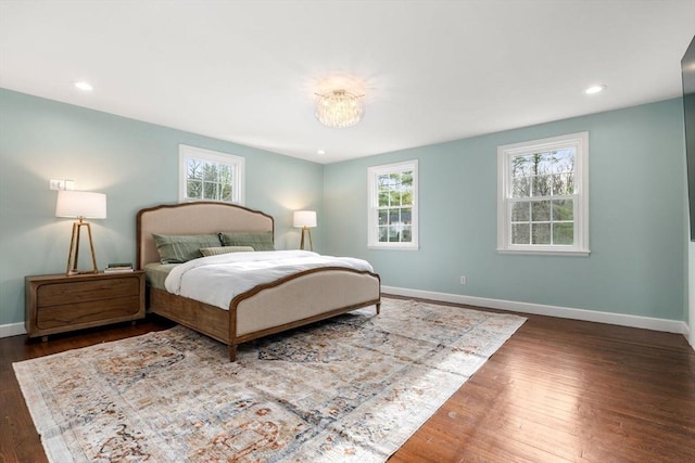 bedroom featuring recessed lighting, baseboards, and wood finished floors