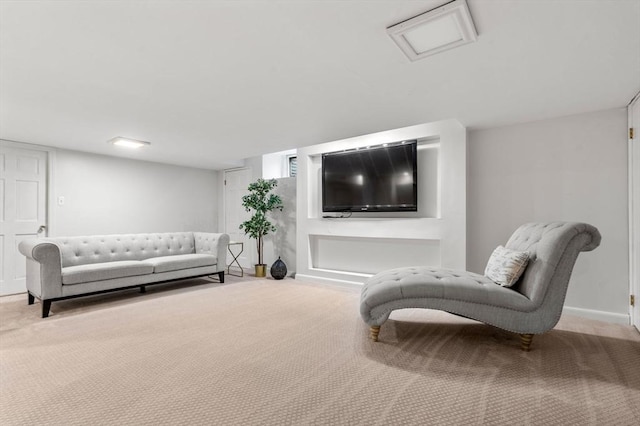 living room featuring baseboards and carpet floors