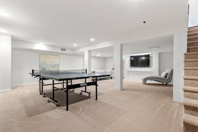 rec room featuring recessed lighting, light colored carpet, visible vents, and baseboards